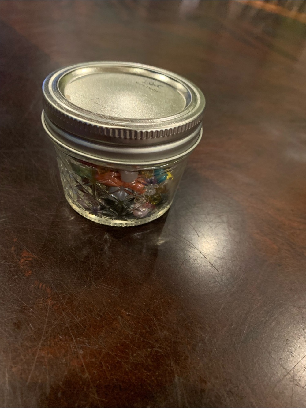 Small Glass jar of mixed bead to create jewelry or anything!!